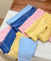 ⁦طقم بيجاما مكون من قطعتين فنيلة بأكمام طويلة وسروال⁩ - الصورة ⁦4⁩