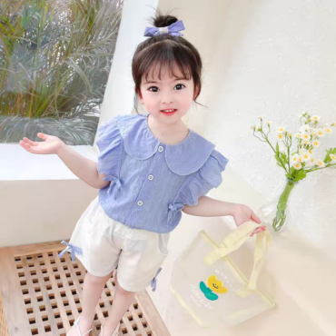 ⁦طقم بناتي راقي مكون من شميز بياقة مستديرة مكشكش وشورت.⁩ - الصورة ⁦6⁩
